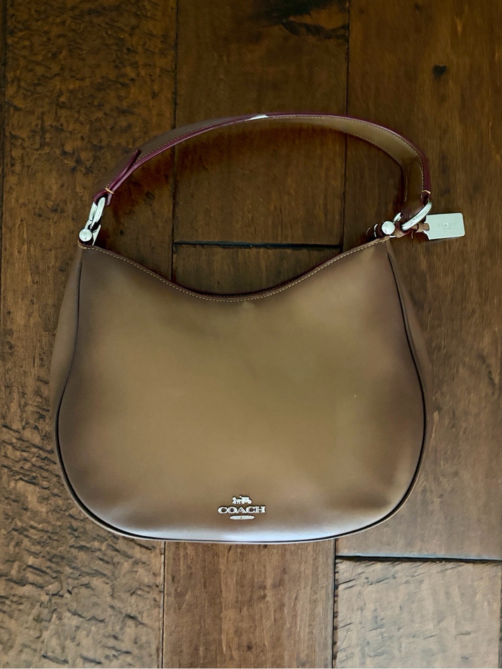 Brown leather Coach purse.